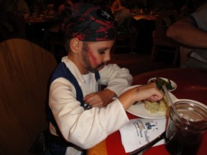 Kevin enjoying Mahi Mahi at the Whispering Canyon in the Wilderness Lodge Resort